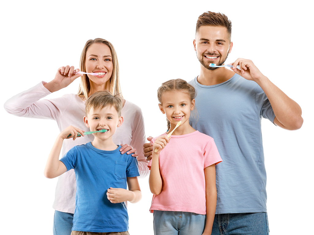 Portrait Of Family Brushing Teeth